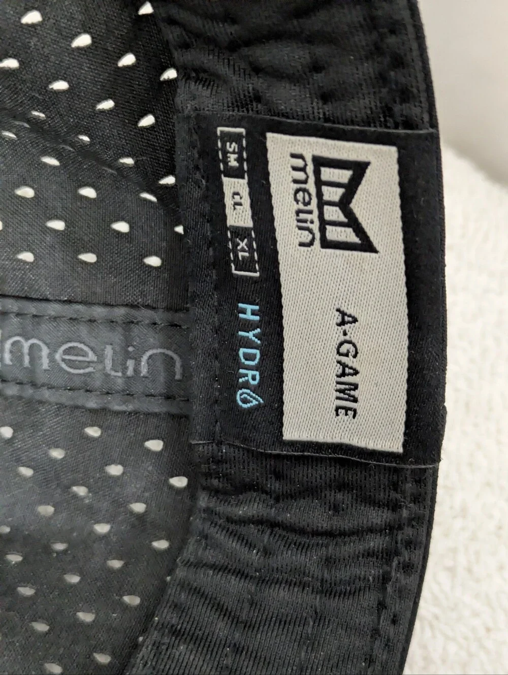 Melin A-Game Hydro Black Performance Snapback Hat